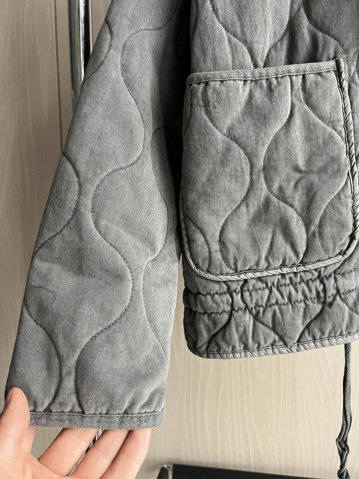 Stylová univerzální bunda s detaily kapes