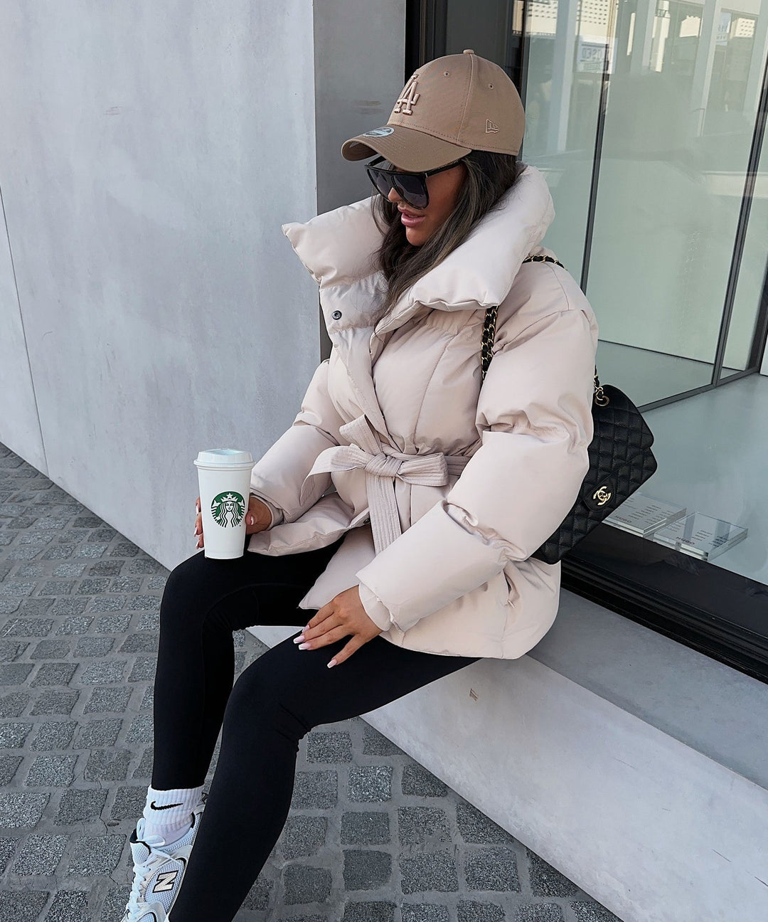 Women's Quilted Coat with a High Neck and a Zip