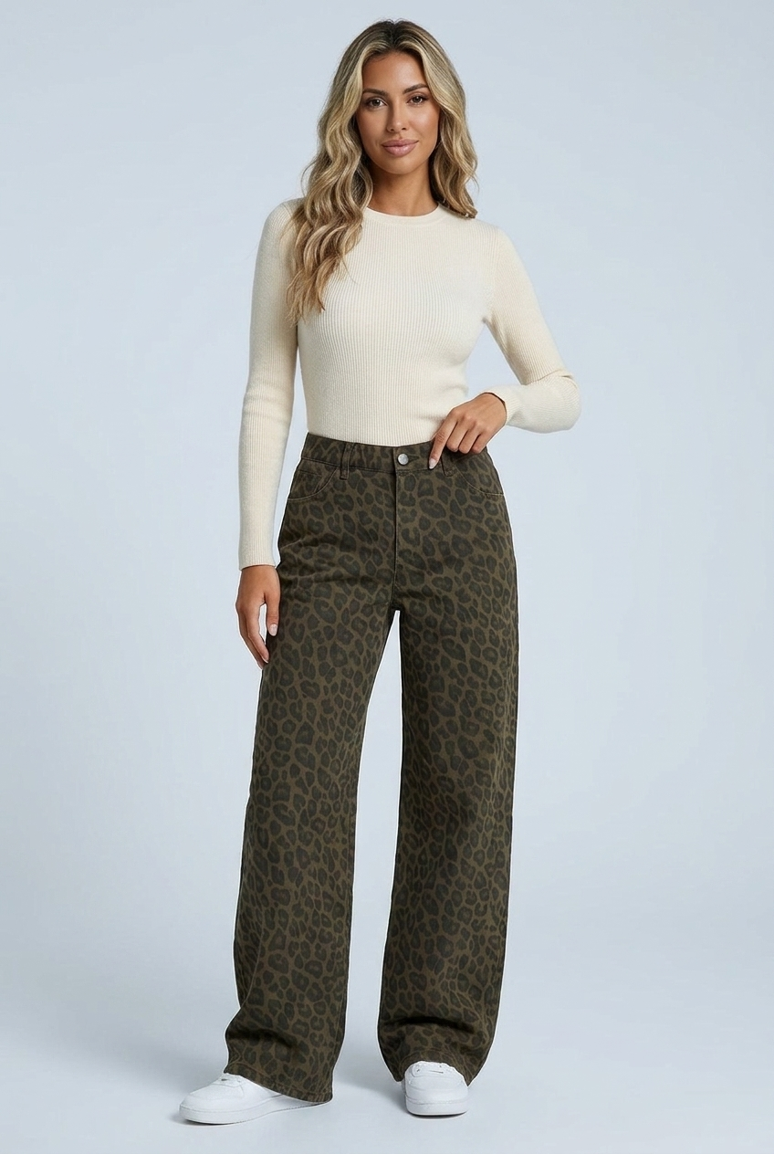 Women's leopard print wide-leg trousers with a high waist, worn with a cream knit