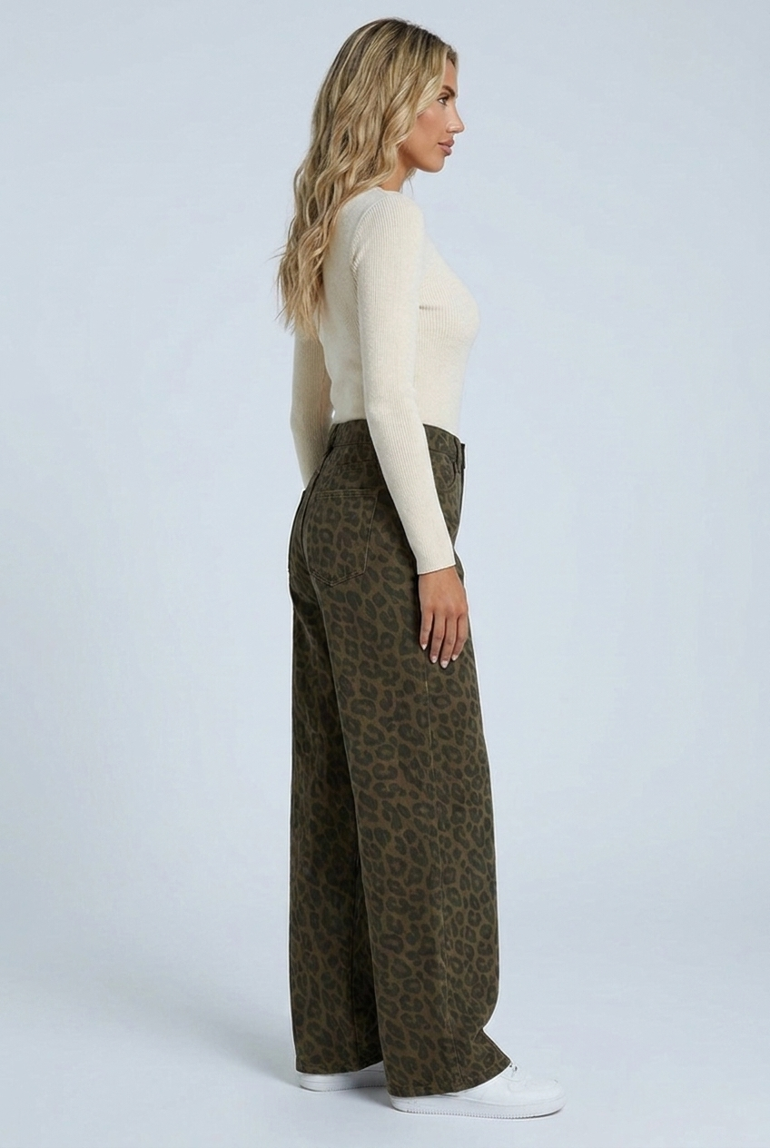 Side view showing the wide leg falling straight to the hem